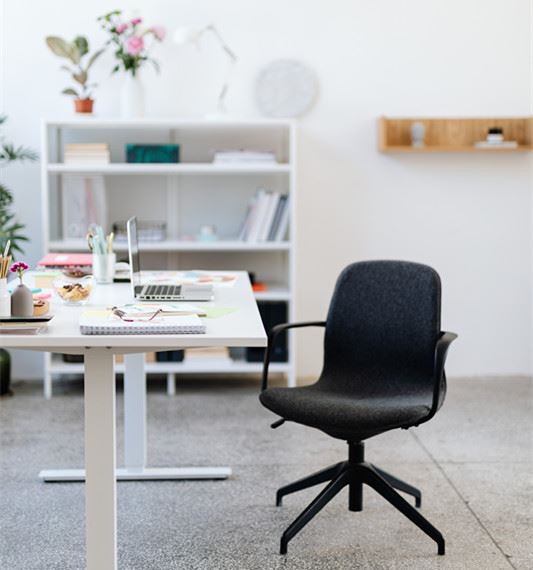Canva - Black Office Rolling Chair Beside White Wooden Table_